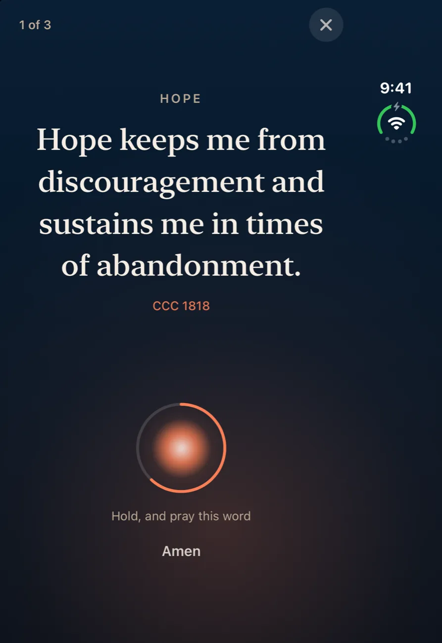 Ember on iPhone Duo closed outer display showing the daily prayer: a line from the Catechism above the hold ring and the word Amen.